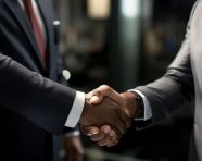 A photo of a men shaking hands in successful business agreement