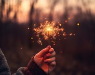 Fireworks for new years day image of person holding a sparkler i