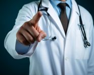 Doctor hand pointing on empty space, soft focus - can be used for montage your texts or pictures