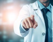 Medical doctor pointing her finger, health and medical stock image