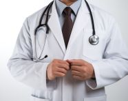 A doctor points his finger towards the side with a doctor jacket vgif, health and medical stock image