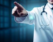Doctor pointing to a blue hand pointing stock photo, health and medical stock image