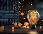 A photo of a digital marketing data analysis inside a glowing light bulb, finance stock photo