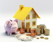 A photo of a investment in real estate saving money to buy a new home with note on white background
