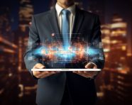 Digital marketing concept in businessmans hands holding a tablet computer, seo stock images for marketing campaigns