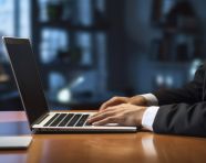 Ms man hands with icon of cloud earth icons on laptop table, seo stock images for marketing campaigns