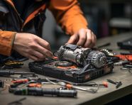 A photo of a technician repairing broken laptop notebook computer with screwdriver, free ai prompts for computer and communication