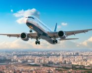 Airplane for transportation flying over the city on beautiful, air transportation stock images, ai prompt air transportation, airplane stock images