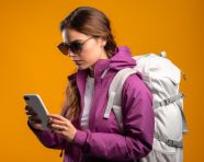 Backpacking woman checking social media, adventure travel stock images, adventure travel ai prompts, travel stock images ai