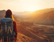 Backpacker enjoying the sunset in the mountains, adventure travel stock images, adventure travel ai prompts, travel stock images ai