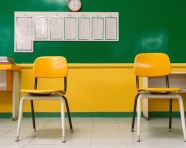 Empty interior of classic school classrooms with white chalk on the yellow wall and green chair, back to school stock images ai, back to school stock illustrations ai, back to school ai prompts