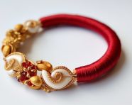 Rakhi cashew and red bangle, raksha bandhan stock photo, raksha bandhan vector illustration, raksha bandhan ai generator