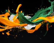A picture of an orange and green paint splash, independence day stock image, independence day ai prompt