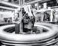 A long exposure shot of a factory floor with the machinery all in motion, industrial machinery stock images ai, midjourney prompt ideas