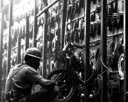 Man at work in a factory, industrial machinery stock images ai, midjourney prompt ideas