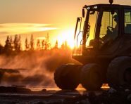 Bulldozer operator working in the sunset, industrial machinery stock images ai, midjourney prompt ideas