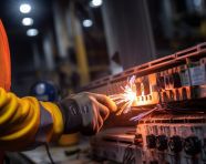 Close-up of worker's hands operating control panel, industrial machinery stock images ai, midjourney prompt ideas