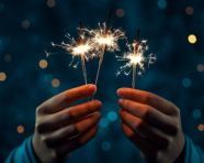 A person holding two sparklers in their hands, diwali festival stock image, diwali festival ai prompt