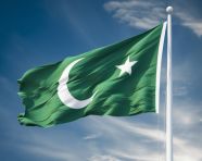 Pakistan flag displayed against a blue sky, pakistan independence day photos