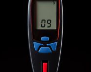 Glucometer with a single drop of blood, diabetes concept
