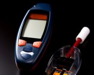 Measuring blood sugar with glucometer, diabetes concept