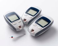 A close-up of a blood sugar monitor, diabetes concept