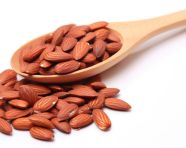 Almonds in a wooden spoon, almond image