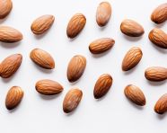 Some almonds are on a white background, almond image