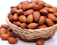 Freshly picked almonds in a white basket, almond image