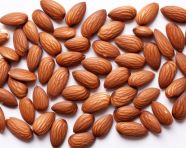 A close-up shot of a handful of almonds, almond image