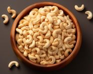 Bowl of freshly chopped cashews, cashew image