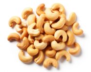 An image of roasted cashews on a white background, cashew image