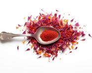 Red saffron flowers on a spoon, saffron flower image