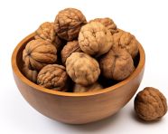 Walnuts in a white bowl, walnuts image