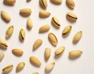 Several pistachios on a white background, pistachio nut image