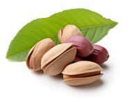 Pistachio nuts placed on a white background with leaf, pistachio nut image