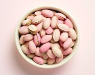 Pistachios in bowl on white background top view, pistachio nut image