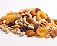 A dried dry fruits with nuts is on white background, dry fruits mix image