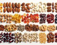 Various nuts in natural colors on white background, dry fruits mix image