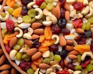 A wide shot of a bowl of mixed dried fruits, dry fruits mix image