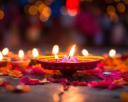 Diya in foreground a beacon of light, diwali festival stock image, diwali festival ai prompt