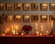 Table with several brass candle holders, diwali festival stock image, diwali festival ai prompt