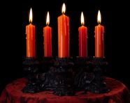 Three candles facing each other on a darkened table, diwali festival stock image, diwali festival ai prompt
