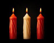 Three red candles sit in a row near a black background, diwali festival stock image, diwali festival ai prompt