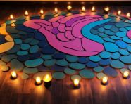 A rangoli with candles on top of them, diwali festival stock image, diwali festival ai prompt