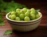 Fresh gooseberries in a bowl, gooseberry fruit image