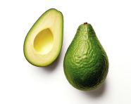 Closeup of cut avocado half, avocado image stock photo