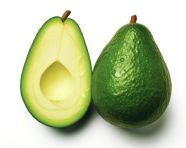 Two avocado halves on top of a white background, avocado image stock photo