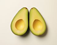 Avocado cut in half on white background, avocado image stock photo
