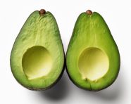 Two avocado halves on white, avocado image stock photo